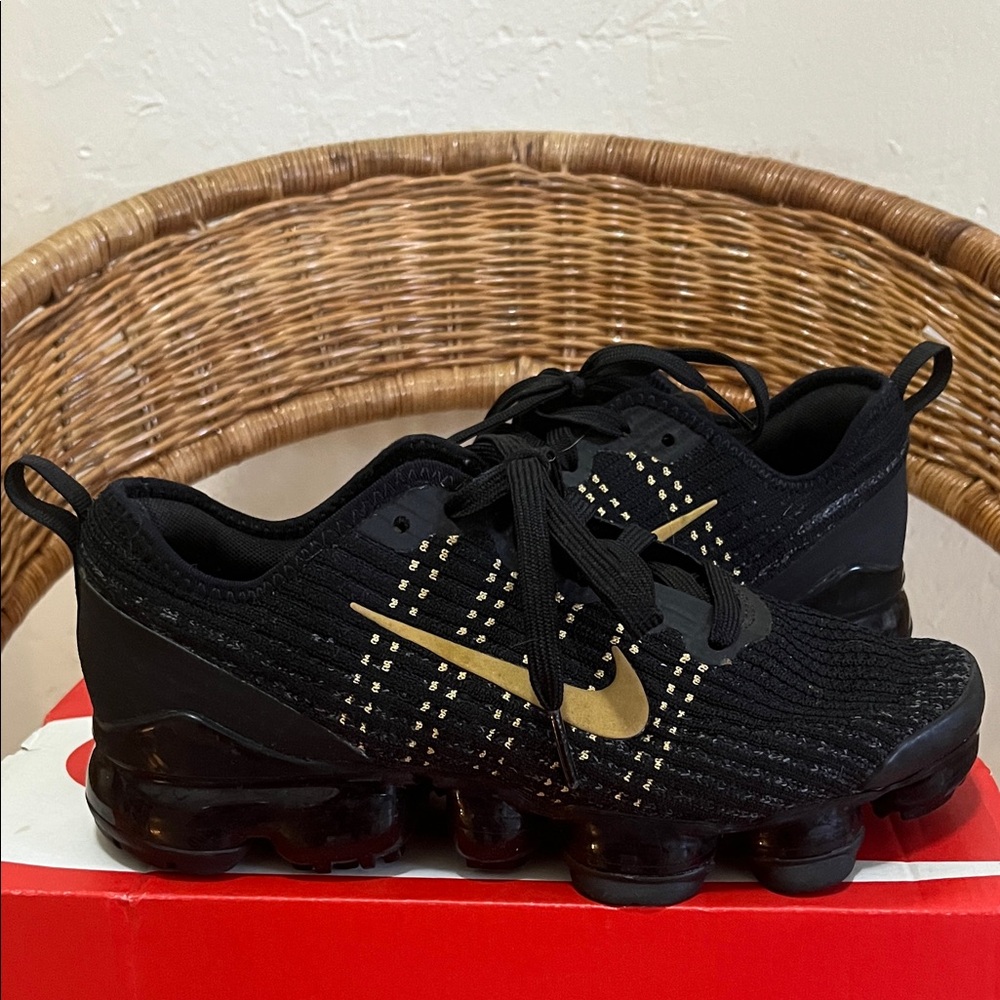 Nike Kids Black and Gold Sneakers